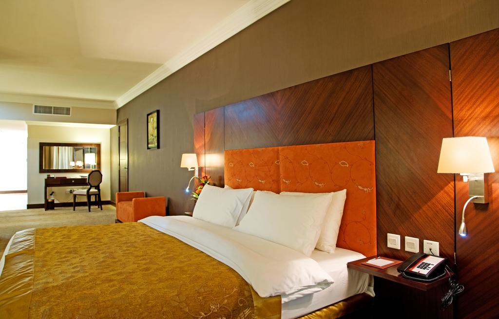 Amt Mena Aparthotel Доха Стая снимка